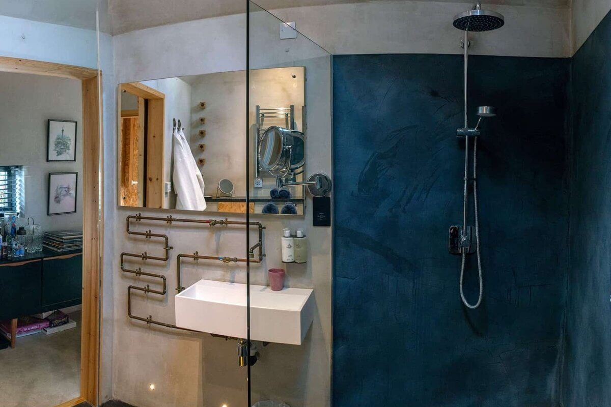 Interior shot of modern shower room in stable conversion to holiday let