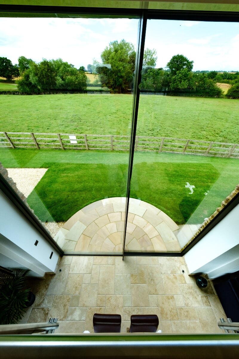 Double glass doors looking out of a barn conversion